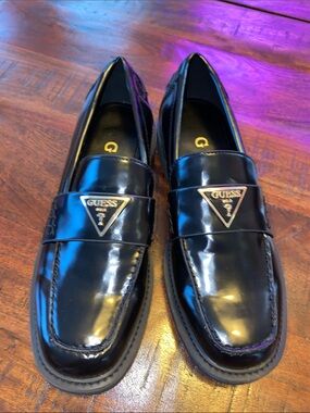 GUESS Black Patent Loafers with Gold Triangle Logo
